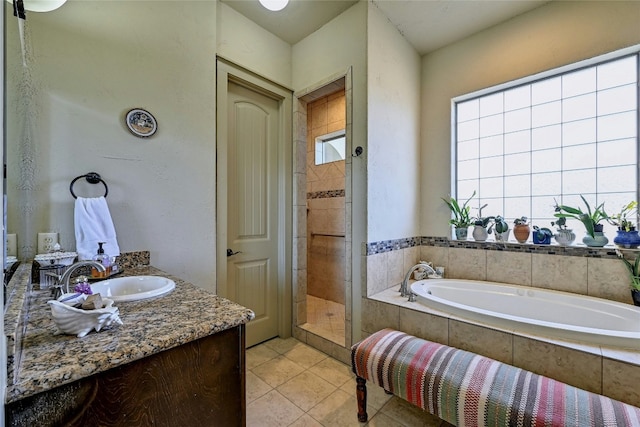 102 Maravilla Way, Horseshoe Bay, TX 78657 - full bathroom with plenty of natural light, vanity, a bath, and tile patterned floors