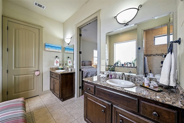 102 Maravilla Way, Horseshoe Bay, TX 78657 - ensuite bathroom with two vanities and tile patterned flooring