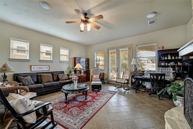 102 Maravilla Way, Horseshoe Bay, TX 78657 - living room with ceiling fan, healthy amount of natural light, and tile patterned flooring