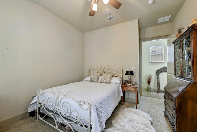 102 Maravilla Way, Horseshoe Bay, TX 78657 - carpeted bedroom with baseboards and a ceiling fan