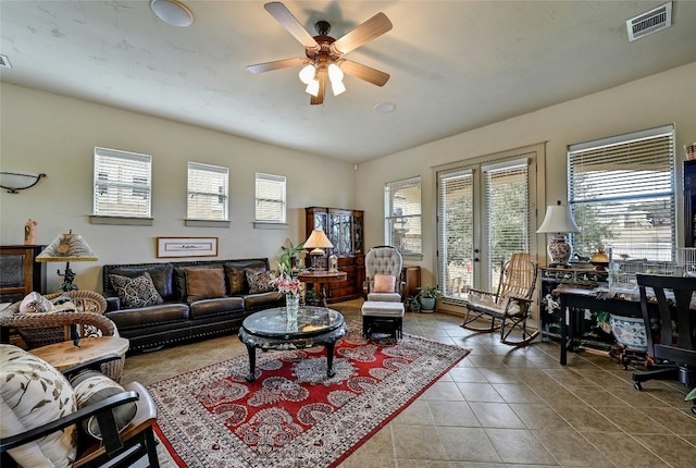 102 Maravilla Way, Horseshoe Bay, TX 78657 - living room with tile patterned floors and ceiling fan