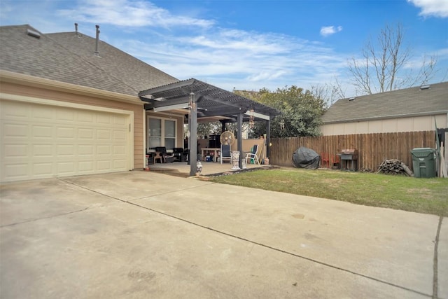 405 Shadowpoint St, San Marcos, TX 78666 - view of patio / terrace with a pergola, driveway, and an attached garage