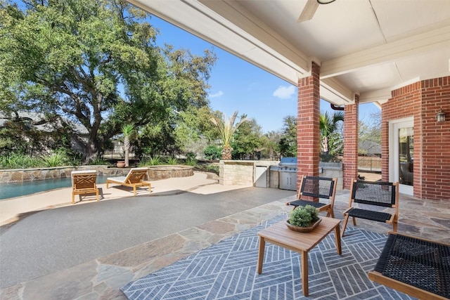 30302 Berry Creek Dr, Georgetown, TX 78628 - view of patio / terrace with grilling area, an outdoor pool, an outdoor kitchen, and ceiling fan