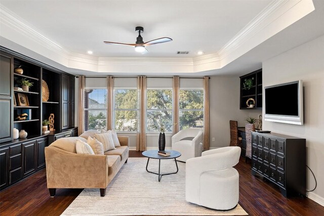 30302 Berry Creek Dr, Georgetown, TX 78628 - living area with dark wood finished floors, a raised ceiling, and visible vents