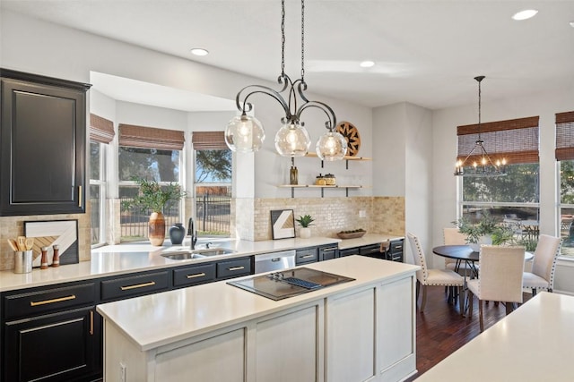 30302 Berry Creek Dr, Georgetown, TX 78628 - kitchen with light countertops, a wealth of natural light, recessed lighting, and a sink
