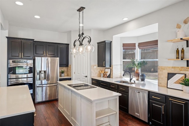 30302 Berry Creek Dr, Georgetown, TX 78628 - kitchen featuring appliances with stainless steel finishes, open shelves, a sink, and light countertops