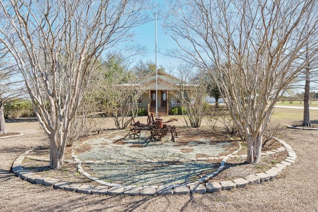 view of yard featuring covered porch