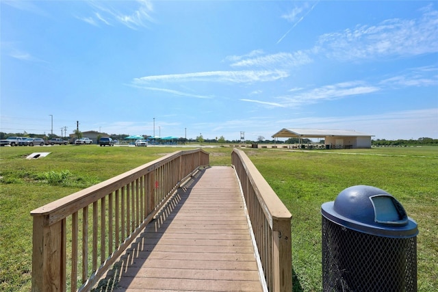 view of home's community featuring a lawn