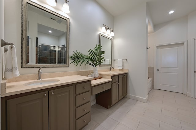 bathroom with a bath, a stall shower, two vanities, and a sink