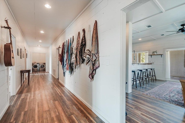 7875 W Fitzhugh Rd, Dripping Springs, TX 78620 - corridor with independent washer and dryer, wood finished floors, and recessed lighting