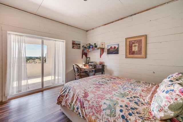 7875 W Fitzhugh Rd, Dripping Springs, TX 78620 - bedroom featuring access to exterior and wood finished floors