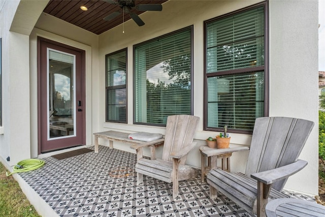 view of patio featuring a ceiling fan