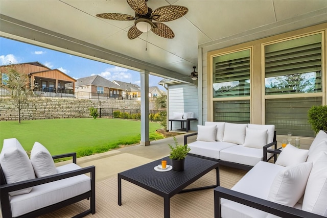211 Singing Sumac Way, San Marcos, TX 78666 - fenced backyard featuring an outdoor living space, ceiling fan, a residential view, and a patio