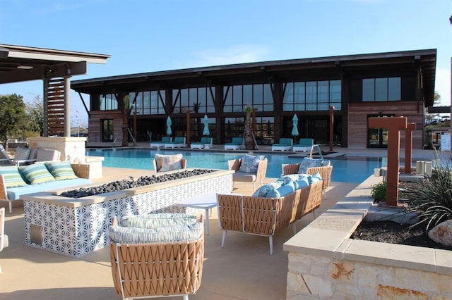 211 Singing Sumac Way, San Marcos, TX 78666 - community pool featuring outdoor lounge area and a patio
