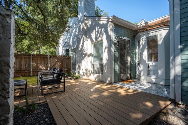 deck featuring fence