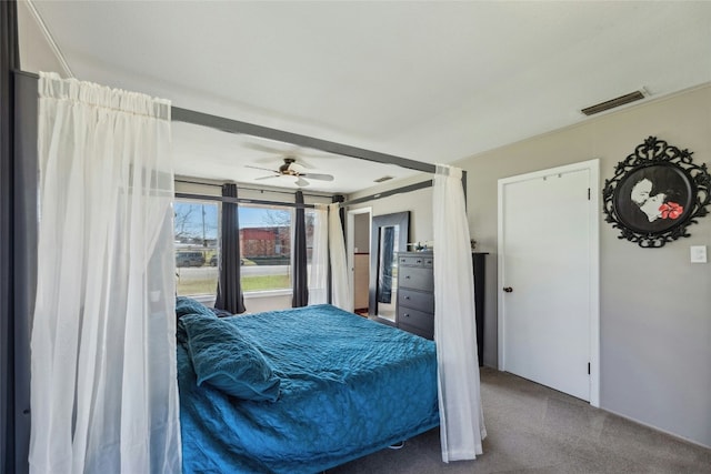 carpeted bedroom with visible vents