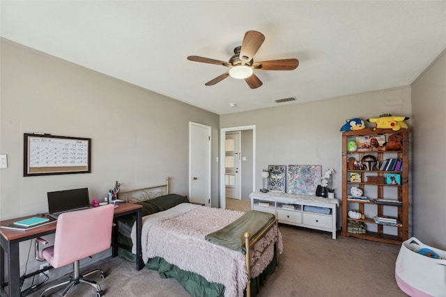 carpeted bedroom with ceiling fan and visible vents