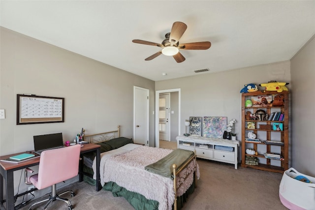 215 S Mulberry St, Luling, TX 78648 - bedroom with carpet flooring, ceiling fan, and an office area