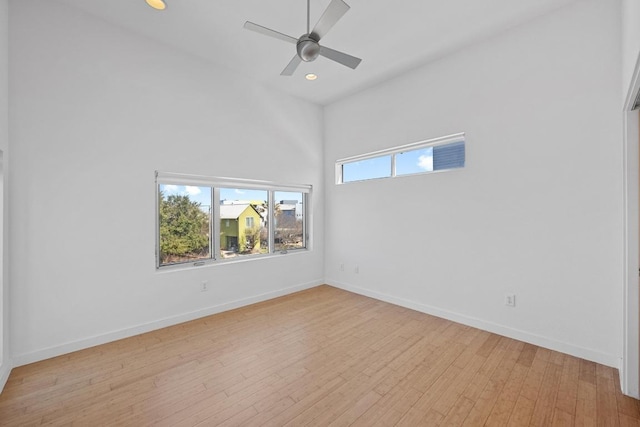 unfurnished room with light wood finished floors, recessed lighting, a ceiling fan, and baseboards