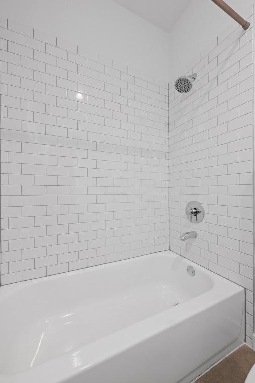 full bathroom with tub / shower combination