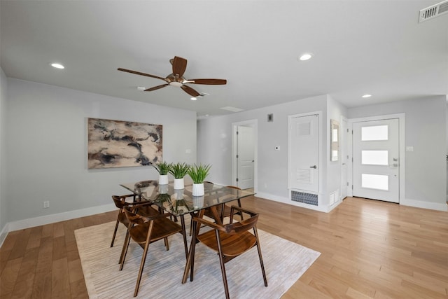 dining area featuring baseboards, visible vents, ceiling fan, light wood-style floors, and recessed lighting