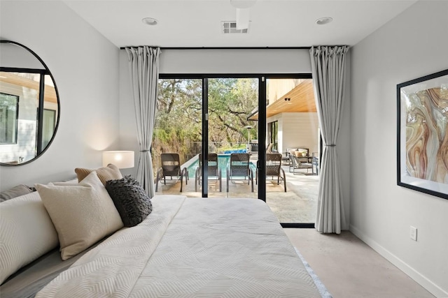 bedroom with access to exterior, recessed lighting, visible vents, concrete floors, and baseboards