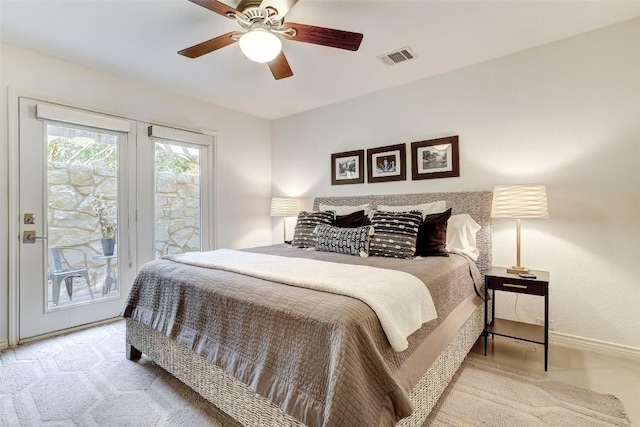 bedroom featuring ceiling fan, light carpet, visible vents, baseboards, and access to outside