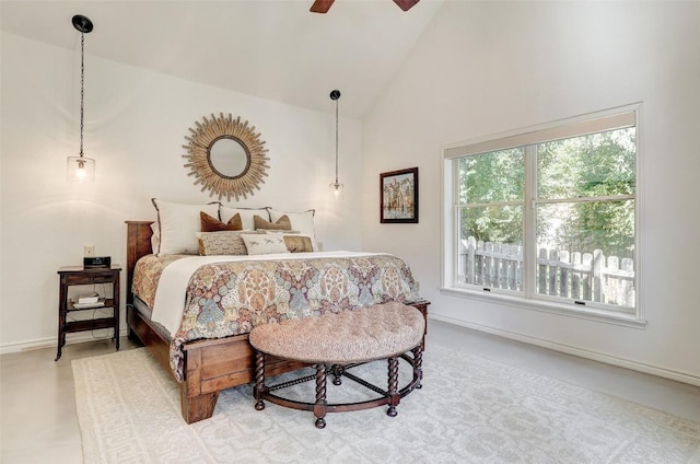 bedroom featuring a ceiling fan, high vaulted ceiling, and baseboards