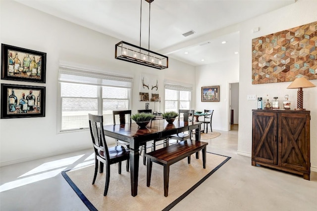 dining space featuring concrete flooring, recessed lighting, visible vents, and baseboards