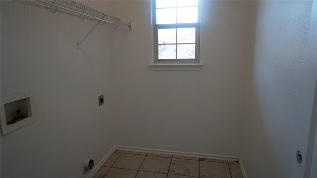 washroom featuring light tile patterned floors, hookup for a washing machine, hookup for an electric dryer, laundry area, and baseboards