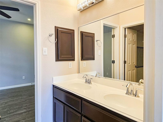 1008 Walsh Hill Trl, Cedar Park, TX 78613 - full bath featuring ceiling fan, baseboards, double vanity, and wood finished floors