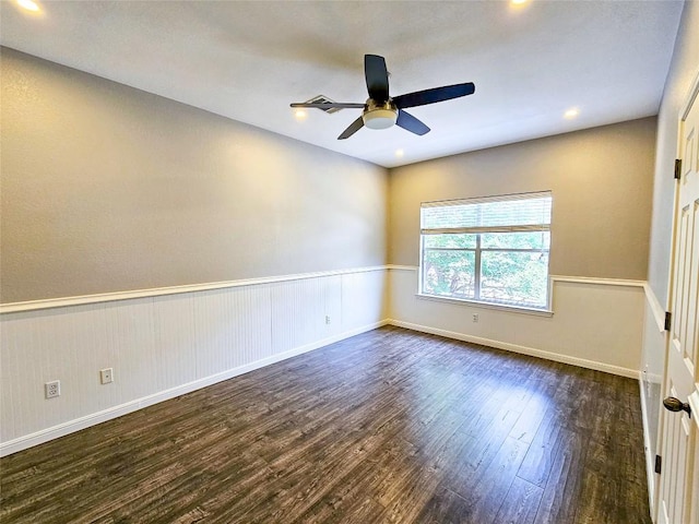 1008 Walsh Hill Trl, Cedar Park, TX 78613 - spare room featuring dark wood-type flooring, a ceiling fan, baseboards, recessed lighting, and a wainscoted wall