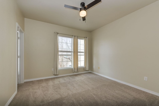12249 Abbey Glen Ln Unit B, Austin, TX 78753 - spare room featuring a ceiling fan, carpet flooring, and baseboards