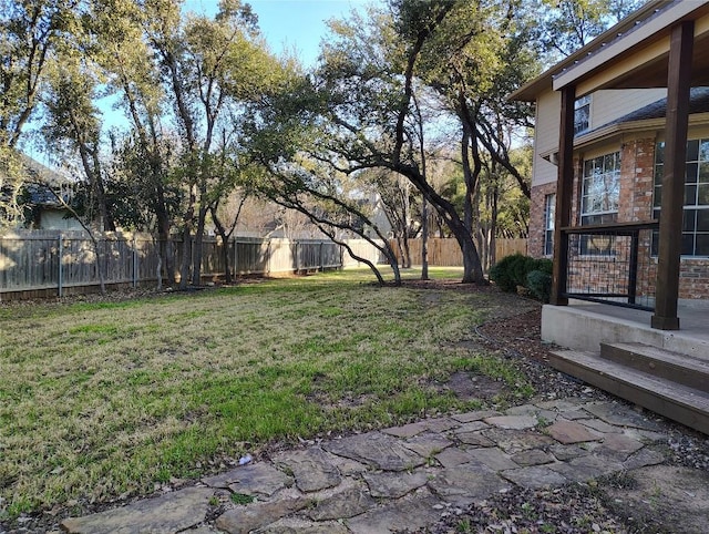 view of yard featuring a fenced backyard