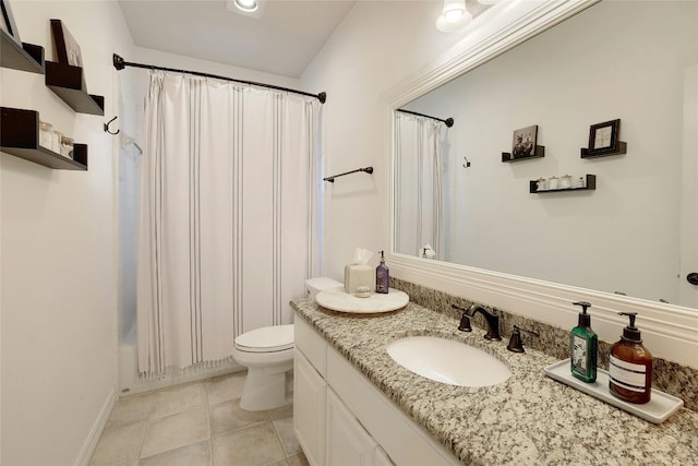 full bath with toilet, tile patterned flooring, and vanity