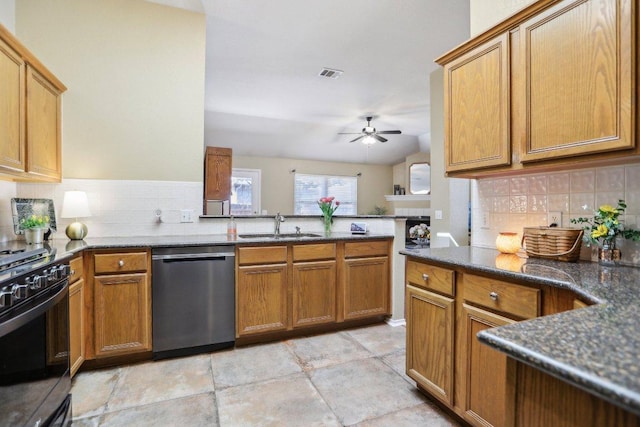 16710 Sabertooth Dr, Round Rock, TX 78681 - kitchen with stainless steel dishwasher, gas stove, a sink, ceiling fan, and decorative backsplash