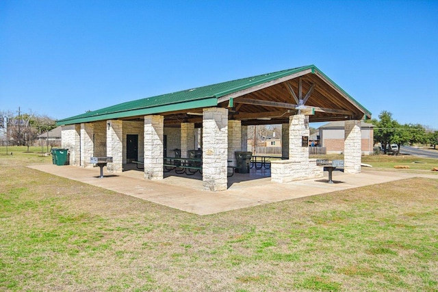 16710 Sabertooth Dr, Round Rock, TX 78681 - surrounding community with a yard and a patio