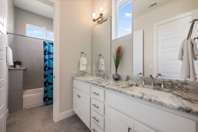 full bath with double vanity, a sink, visible vents, and shower / tub combo with curtain