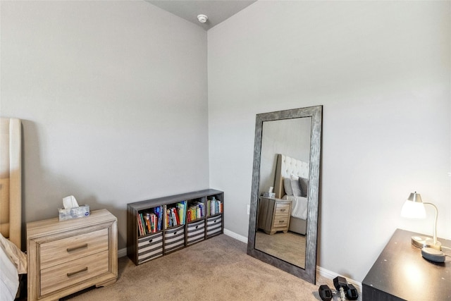 bedroom featuring baseboards and carpet flooring