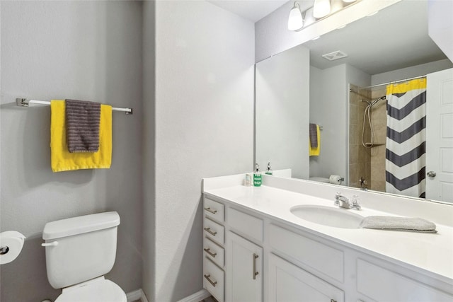 full bathroom featuring toilet, vanity, visible vents, and a shower with shower curtain