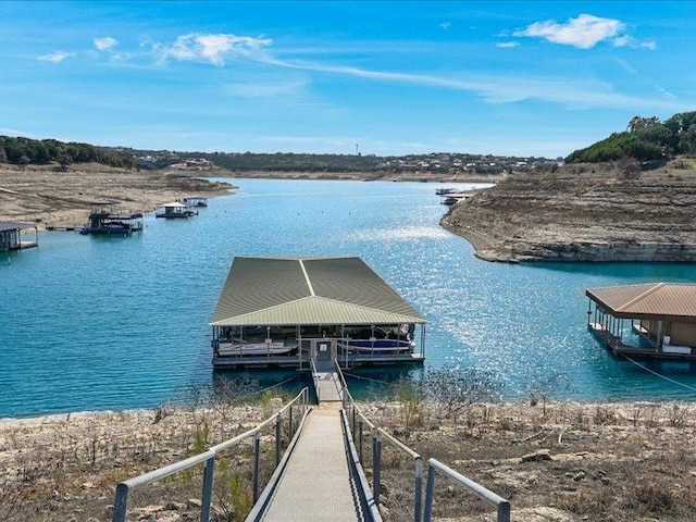 view of dock with a water view