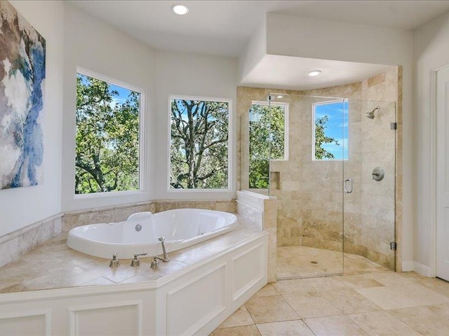 bathroom featuring a stall shower, tile patterned floors, recessed lighting, and a bath