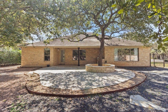 back of house featuring fence and a patio