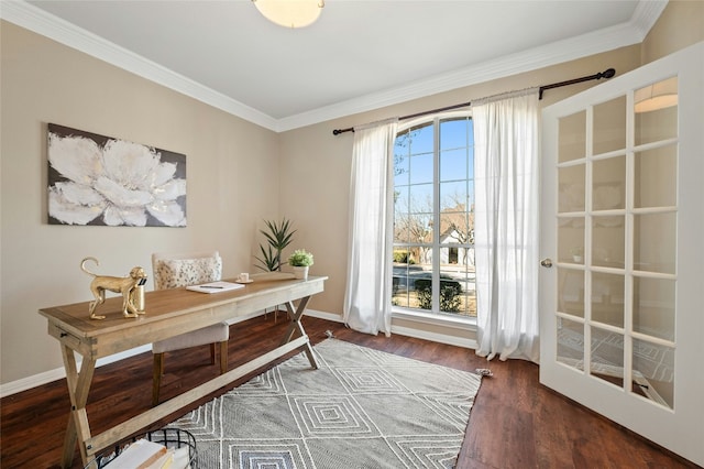 office space with crown molding, baseboards, and wood finished floors