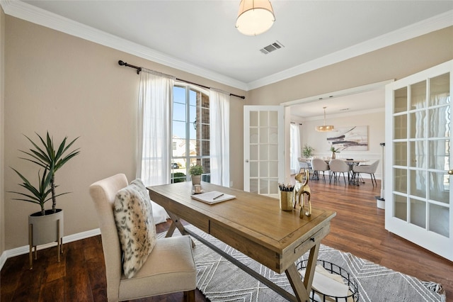 home office featuring baseboards, visible vents, wood finished floors, crown molding, and french doors