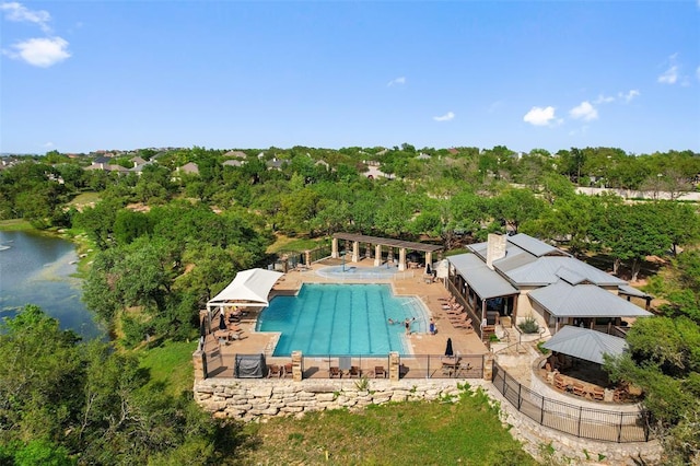 pool featuring a gazebo and a water view