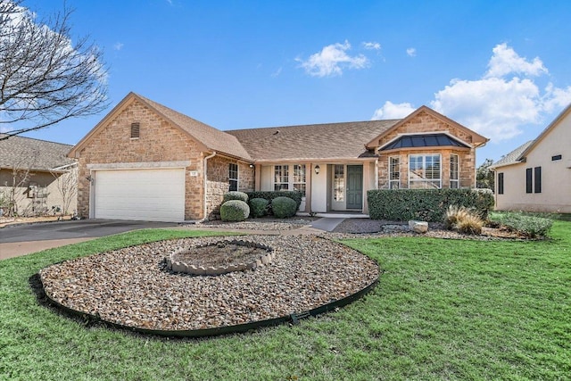 single story home with aphalt driveway, roof with shingles, an attached garage, a front yard, and stone siding