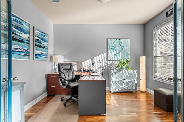 5312 Fort Benton Dr, Austin, TX 78735 - office area with wood finished floors and baseboards