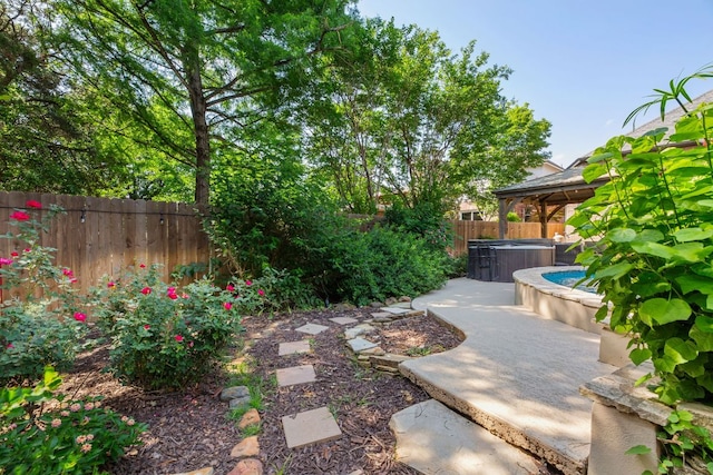 5312 Fort Benton Dr, Austin, TX 78735 - fenced backyard with a hot tub, a patio area, and a gazebo