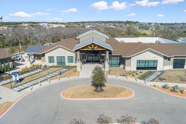 view of building exterior with driveway